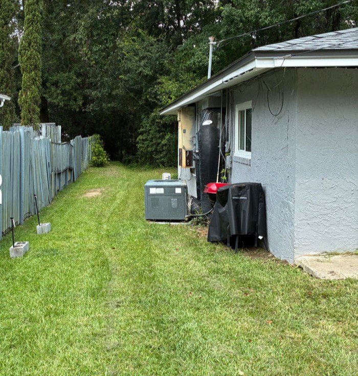 Side yard mowing along fence line